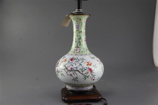 A Chinese famille rose nine peach bottle vase, Qing dynasty, total height 48.5cm including stand and fittings, some restoration